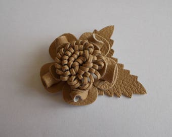 large flower with faux leather sheet