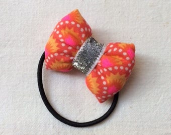 scrunchy with a Petit Pan Wasabi red fabric bow