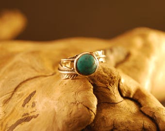 Silver ring original and handcrafted earmuff "pluma turquesa"