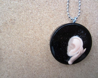 LISTEN - upcycled plastic bottle cap pendant