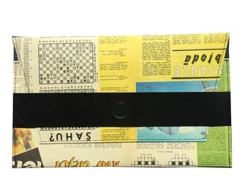 Magazine handbag with black leather details