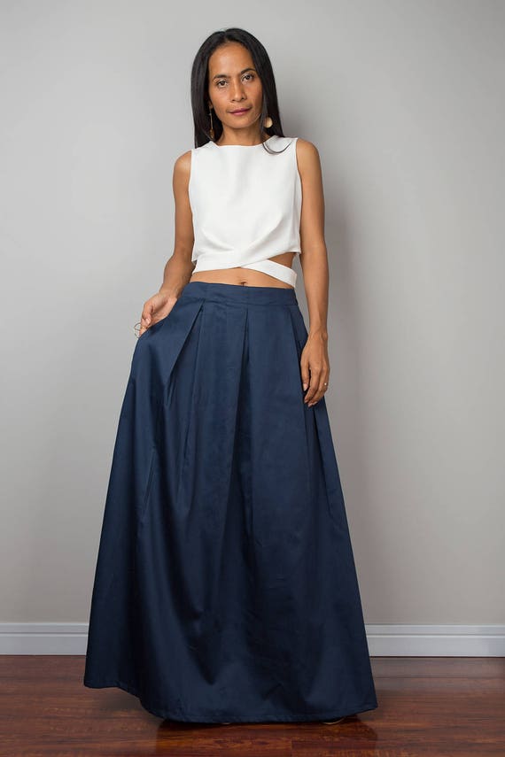 black top with navy blue skirt
