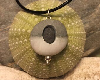 Beach stone jewelry- beach stone necklace with a beachstone inside