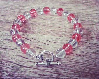 Non-elastic bracelet in coral and clear glass beads
