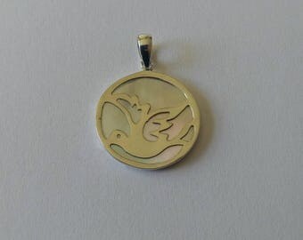 Handmade Sterling 925 silver and mother of pearl pendant.