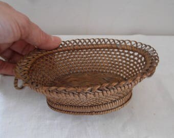 A miniature French vintage woven basket