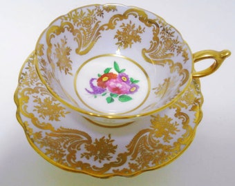 Paragon simply exquisite gold gilt tea cup and saucer MAUVE pastel rose center antique english