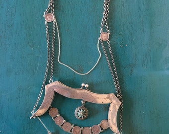 Necklace of different pieces of antique silver