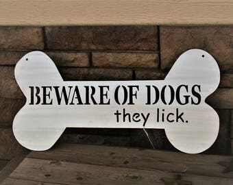 Shiny Aluminum Beware of Dog Sign, Beware of dog he licks. she licks. dog warning sign, friendly dog sign, friendly warning yard sign