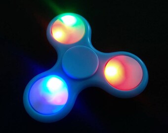 Hand spinner with LED "DELIVERY OFFERED"