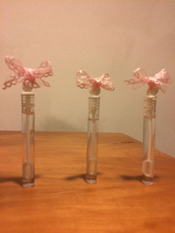 wedding bubbles tubes decorated with the wedding color of the