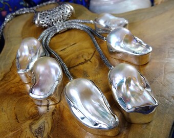Very large champagne baroque pearl pendant set in solid sterling silver