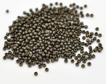 100 metal spacer beads 3 mm bronze