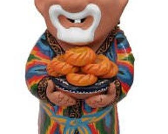 Original figurine of the ceramic Uzbek grandfather. Ceramic figurine made of clay.