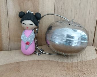 Gray and pink KOKESHI in polymer clay tea ball