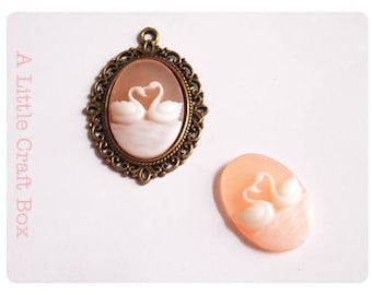 2 cabochon 24x18mm - semi-transparent orange color "Swans"