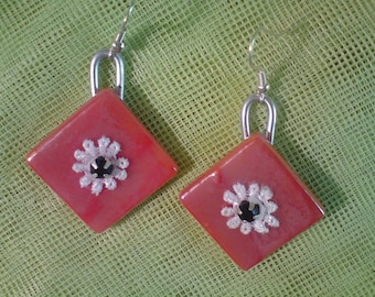 Coral. Molten glass, white cotton flower, rhinestone earrings