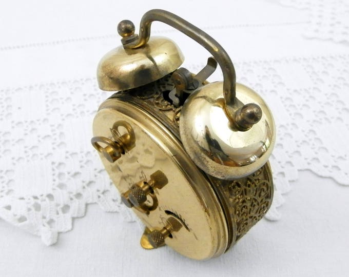 Small Working Vintage West German 1960s Metal Mechanical Wind Up Alarm Clock with Roman Numerals and Filigree Decoration, Mid Century Small Working Vintage West German 1960s Metal Mechanical Wind Up Alarm Clock with Roman Numerals and Filigree Decoration, Mid Century