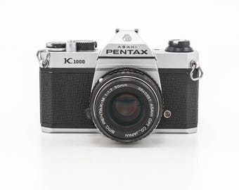 ASAHI Pentax K1000 35mm Film Camera with 50mm Prime Lens - Great Working Student Camera with 1 roll of Film
