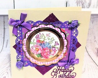 Beautiful detailed female birthday card with dahlia purple lace frame and bows.