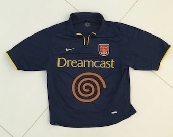 arsenal gold sega shirt