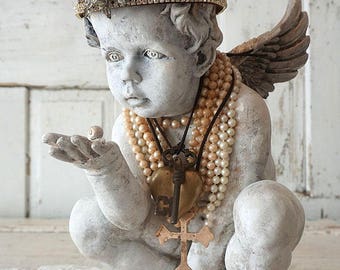 Ornate cherub statue wearing rusty rhinestone crown French Santos inspired distressed painted angel figure handmade decor anita spero design