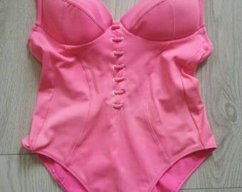 Hot pink lace up front swimsuit with push up