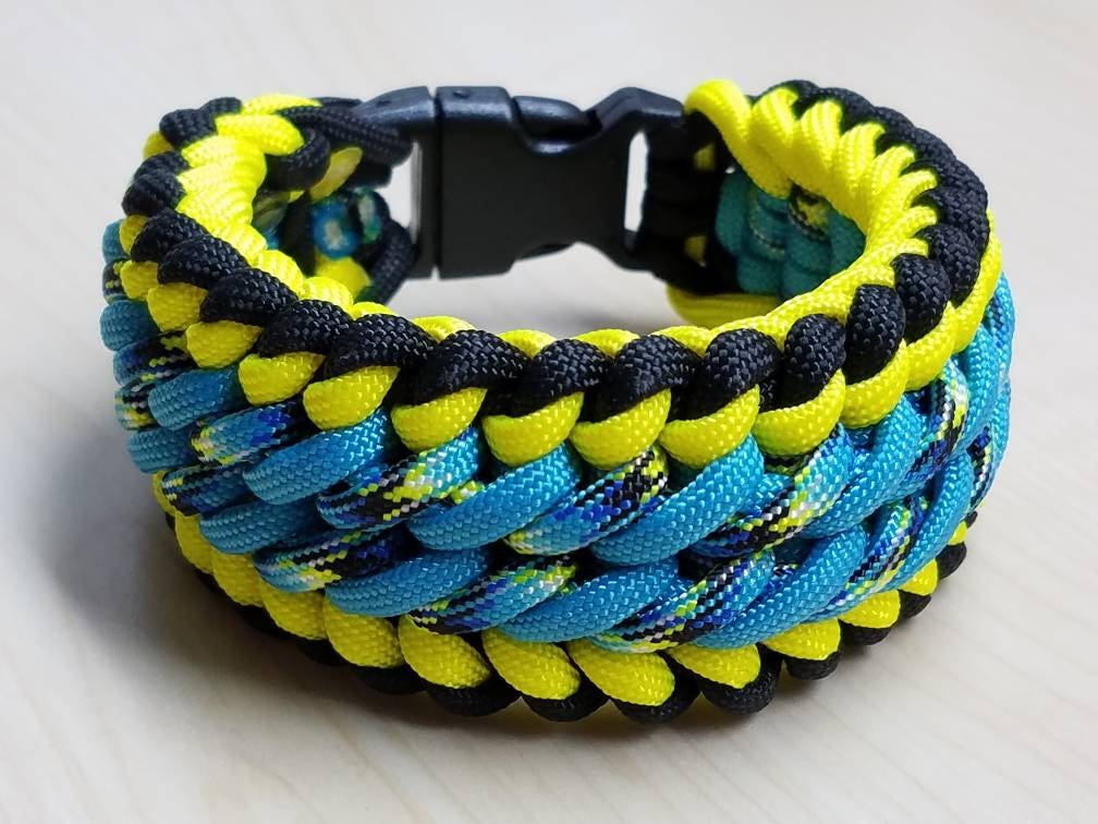 Turquoise yellow & black paracord bracelet with buckle