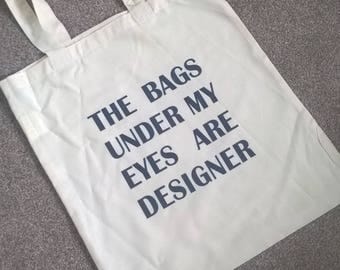 The bags under my eyes are designer- tote shopping bag, fashion tote, designer bag, customise yours, customize, fashion bag, shopping