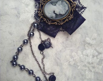 Brooch Victorian style antiqued metal and black satin