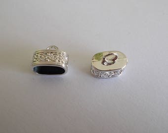 1 set of 2 silver DQ caps for cords