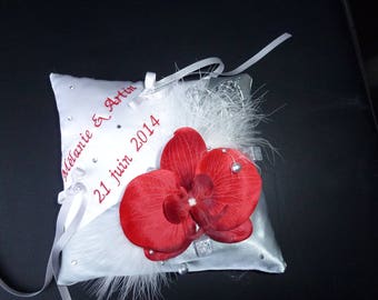 Embroidered red and silver cushion