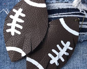 Leather football earrings with a drusy stone.
