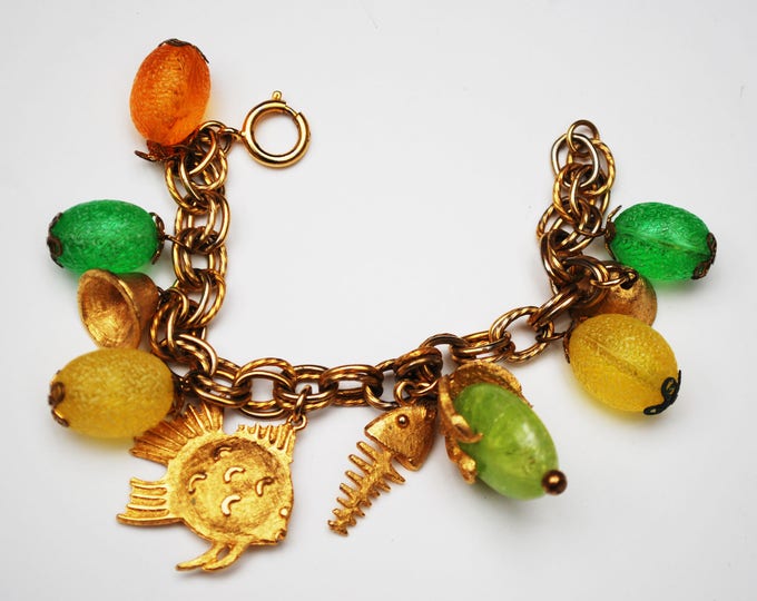 Cha cha Bracelet - colorful Tutti Frutti - gold fish -yellow orange green lucite - plastic - gold bell - dangle Bangle