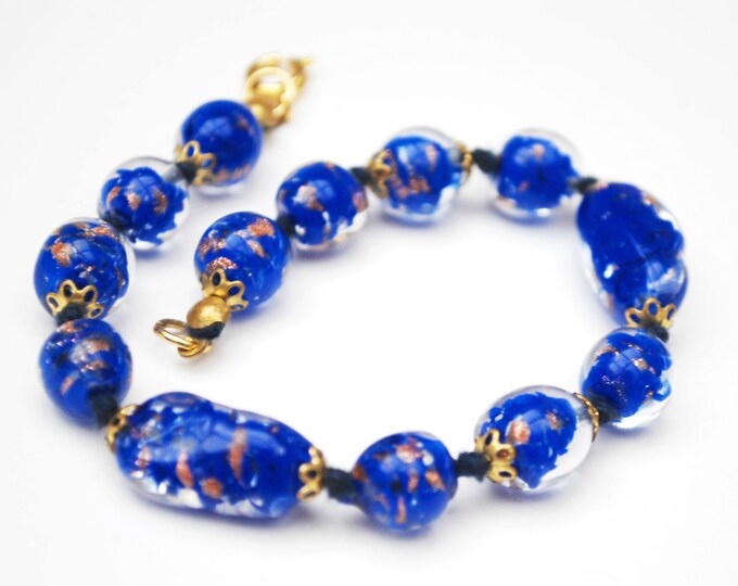 Italian Glass bead bracelet - Venetian clear and blue beads - gold sparkle - hand knotted - Art Glass