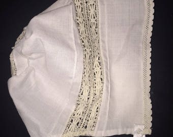 Rows of Heirloom French lace insertion on a baby bonnet or hat, Christening, Dedication with Swiss batiste fabric