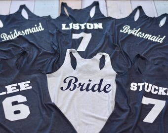 6 Bridesmaid tanks. 6 Bachelorette Party Shirts with Number and Name on Back. Customized Bridesmaid Shirts. XS-2XL Sizes. Choose colors.