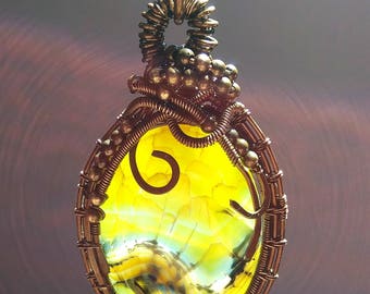 Pendant. Natural agate in copper wire.