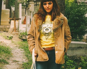 Coat with faux fur