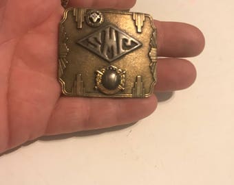 Vintage mason's belt buckle