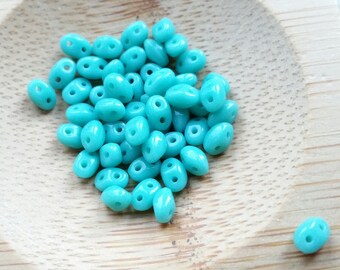 Toho. 50 beads two hole 5 mm