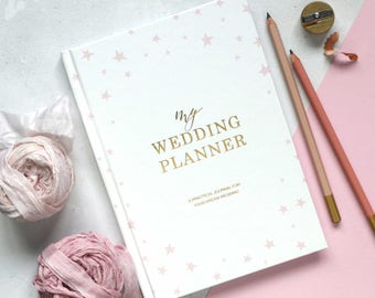 Open up the Blush and Gold wedding planner