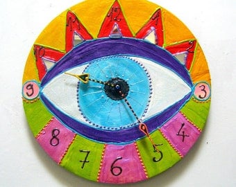 Clock "eye" in acrylic paint and embossed - art singular diameter 33 cm