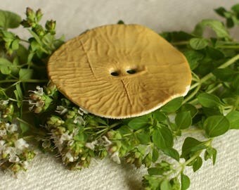 LARGE button - round and thin, saffron yellow