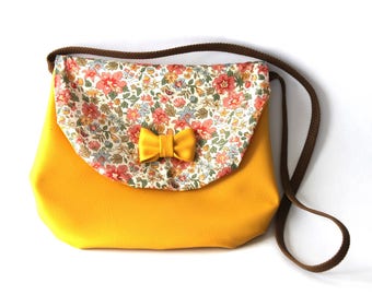 bow mustard and liberty shoulder bag