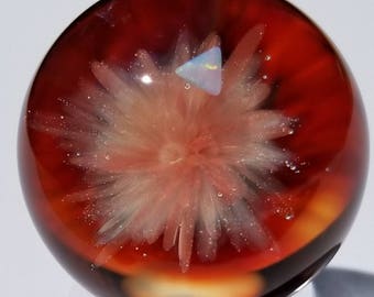Pink and red art glass marble with opal