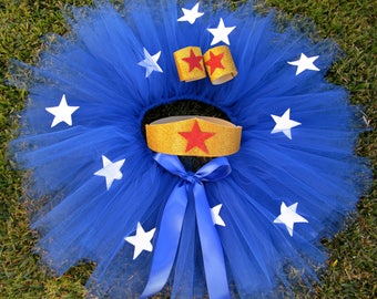 Girls Wonder Woman Themed Tutu Halloween Costume with Glitter Headband and Glitter Star Wrist Cuffs.
