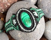 Malachite Macrame Bracelet in green and black. Yoga jewelry. Heart chakra, throat chakra, third-eye. Capricorn, Scorpio.