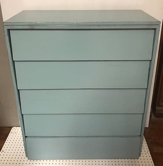 Tall blue dresser with five drawers
