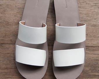 white slip on flat sandals